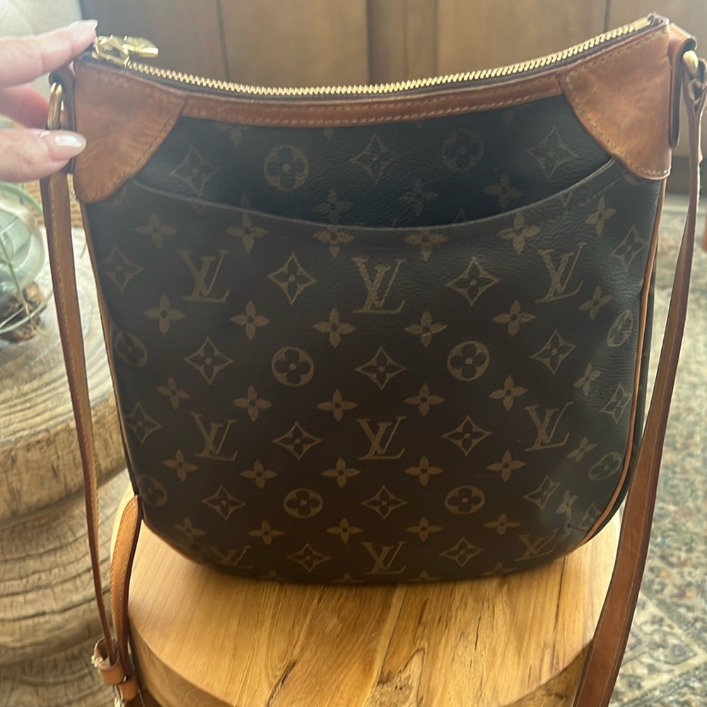 Louis Vuitton women’s monogram Odean PM crossbody bag
